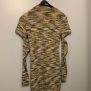 This H&M dress is multicolored and shows off arms a little